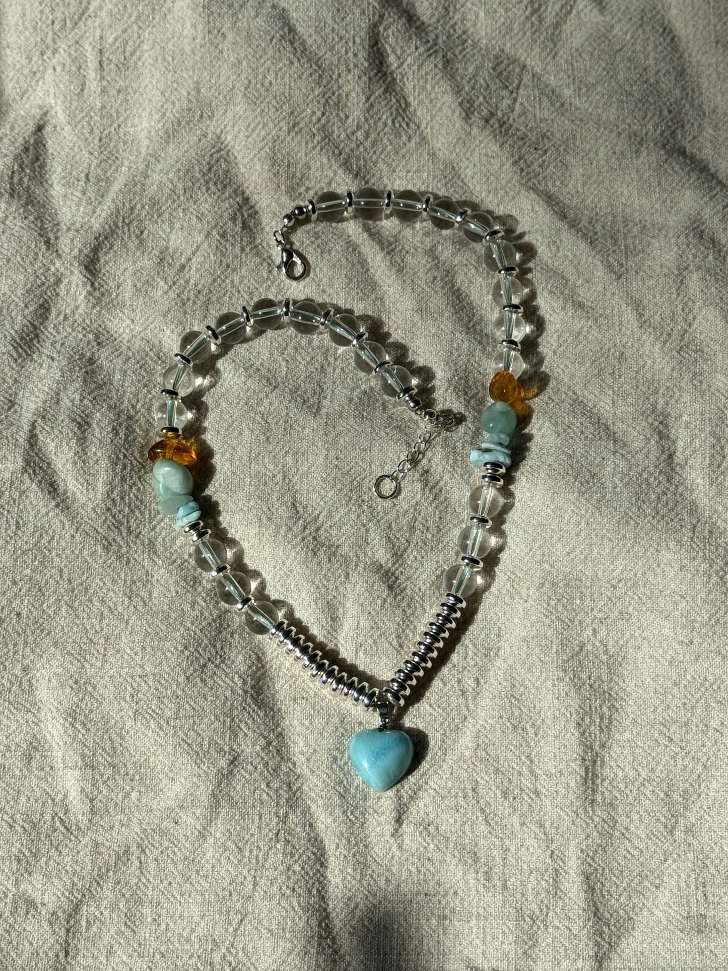 Blue larimar pedant, Dominican Ambar, Brazilian quartz neclace.
